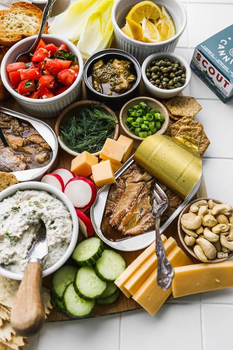 Tinned Fish Charcuterie Board ("Seacuterie") | Walder Wellness, RD Tuna Charcuterie Board, Fish Board Ideas, Sardines Charcuterie, Canned Fish Charcuterie, Tin Fish Pairings, Tin Fish Charcuterie, Charcuterie Board Fish, Tinned Fish Charcuterie Board, Tin Fish Board