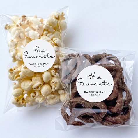 "Matching Dog Treat Favors:  https://www.etsy.com/listing/1494393259/customizable-dog-treat-wedding-favors?click_key=e024d846ba110989fcc1ddeab2b89b1a9d4bbd56%3A1494393259&click_sum=7c3cd685&ref=shop_home_recs_1&pro=1&sts=1 OR  https://www.etsy.com/listing/1508210439/customizable-dog-treat-wedding-favors Simple His & Her Favorites Wedding Favors CANDY IS NOT INCLUDED!!  Coming in quantities of 20, (10 His and 10 Hers) these clear self-sealing bags measure 4x6 inches with a 1.5 inch circle label.  They are self-sealing and come EMPTY ready for you to fill with your favor candy!  PRODUCT INFORMATION:  - Bags and Stickers are sold in quantities of 20. - Each circle sticker is 1.5\" comes beautifully printed with 'his favorite' AND 'her favorite' - Stickers and Bags will arrive unassembled so t Favorite Candy Wedding Favor, Wedding Favor Edible, Wedding Gifts For Guests Food, Wedding Favors His And Her Favorite, Wedding Favors Snacks, Candy Wedding Favours, His And Hers Snacks Wedding, Snack Favors Wedding, His And Her Fav Candy Wedding