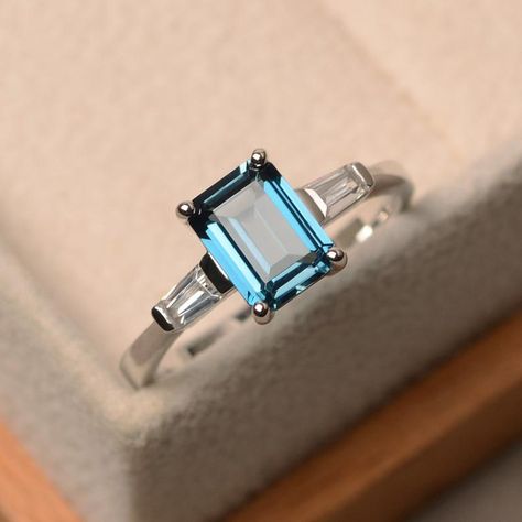 Genuine London blue topaz ring emerald cut three stone ring | Etsy Luo Jewelry, Cushion Cut Halo Ring, Morganite Engagement Ring Set, Ring Emerald Cut, Blue Gemstone Rings, Cushion Cut Ring, Topaz Engagement Ring, London Blue Topaz Ring, Silver Anniversary