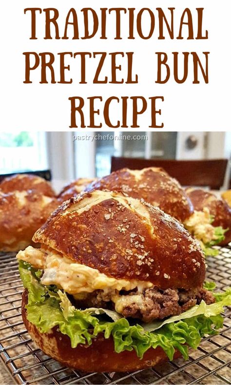 Pretzel buns make the perfect burger or sandwich bun. They are a little chewy and are a lovely burnished brown color. Wonderful for rolls for German sausage sandwiches too, these homemade pretzel rolls get dipped in a weak lye solution before baking, giving them that signature shiny brown crust. #pretzelbuns #pretzelrolls #germanrecipe #burgerbuns #traditionalpretzelbuns #pastrychefonline Pretzel Roll Sandwich, Pretzel Bun Recipe, Pretzel Sandwich, Pretzel Buns, Homemade Pretzel, German Potato Salad Recipe, Traditional German Food, Perfect Burger, Yummy Bread