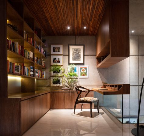 The library cum study table Luxury Lobby Design, Bespoke Chair, Tiles Living Room, Home Contemporary, Wooden Ceiling, Modular Kitchen Designs, Indian Interiors, Lobby Design, Home Luxury