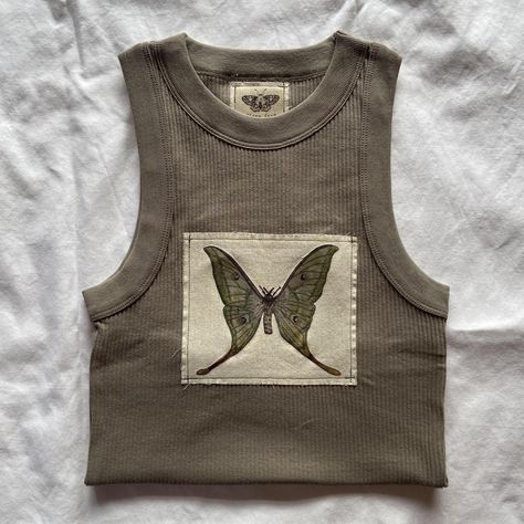 PRINTED LUNA MOTH PATCH TANK TOP 🪲🦋🌿
-gorgeous high... - Depop Moth Clothing, Luna Moth, Green Tank Top, Green Tank, Khaki Green, Hand Sewn, Original Design, Moth, Original Designs