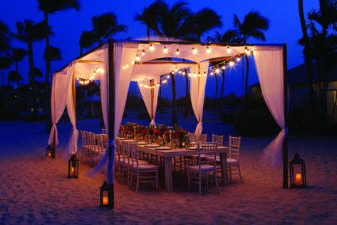 Beach wedding reception at Aruba Marriott Resort.  Beach destination wedding.  beach wedding ideas.  Elegant beach reception.  Twilight wedding.  Sunset wedding.  Dinner on the beach.  Elegant beach dinner party.  Vintage wedding decor ideas.  Bohemian beach wedding ideas. Beach Dinner Party, Vintage Wedding Decor Ideas, Dinner Party Vintage, Beach Dinner Parties, Destination Wedding Aruba, Wedding Ideas Elegant, Beach Reception, Aruba Weddings, Vintage Wedding Reception