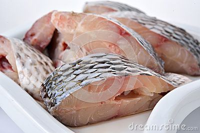 Portion Cut Of Fresh Tilapia Fish Stock Photo - Image of isolated, color: 53787234 Fresh Tilapia, Tilapia Fish, Fish Stock, Fish Plate, Food Images, Freshwater Fish, Fresh Water, Seafood, Photo Image