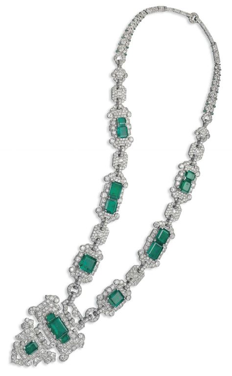 AN ART DECO EMERALD AND DIAMOND SAUTOIR, BY CARTIER. The detachable stylised shield-shaped diamond pendant decorated with cut-cornered rectangular-cut emeralds, to the similarly-set shield-shaped link chain with pavé-set diamond spacers and graduated diamond-set scroll link backchain enhanced with cabochon emerald collets, mounted in platinum, 1926, by Cartier London. #Cartier #ArtDeco #necklace Bijoux Art Deco, Indian Diamond Jewellery, Bvlgari Jewelry, Silver Jewellery Indian, Silver Jewelry Pendant, Mens Silver Rings, Pakistani Bridal, Deco Jewelry, Emerald Jewelry