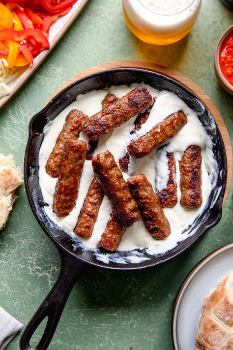 Cevapcici with Kajmak is a unique Balkan dish that will impress you. Grill the cevapcici on your grill, then dip it in Kajmak to serve. This recipe is crowd-friendly and great for picnics and celebrations. #jernejkitchen #kajmak #cevapi #balkanrecipes #cevapcici #grilling #grilled Cevapcici Recipe, Bulgarian Recipes, Beautiful Food Photography, No Dairy Recipes, Supper Recipes, Incredible Recipes, Foodie Recipes, Photographing Food, Quick Recipes