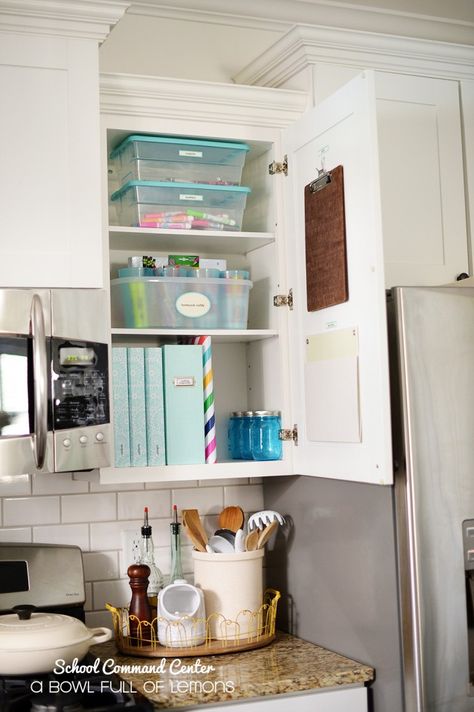 School Command Center via A Bowl Full of Lemons: clipboard for calenders, binders for menu planning and budget, Martha Stewart (@Staples) hanging pocket for school papers to sign/need attention, caddy with homework/art supplies Command Center Cabinet, Kitchen Countertops Organization, Kitchen Organization Countertops, Command Center Organization, Diy Command Center, Command Center Kitchen, Diy Cupboards, Home Command Center, Command Centers