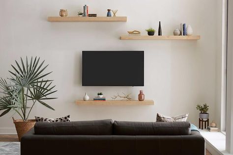 27 Modern TV Mount Ideas for the Living Room and Beyond [PHOTOS] Floating Shelves Around Tv, Floating Shelves Tv, Floating Shelves Ideas, Shelves Around Tv, Small Tv Room, Ruang Tv, Tv Mounted, Floating Shelves Living Room, Shelves Ideas