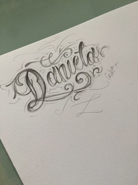 Daniel Name Tattoo, Tattoo Writing Fonts, Daniel Tattoo, Baby Footprint Tattoo, Name Drawings, Chicano Lettering, Chicano Drawings, Bubble Letters, Chicano Art