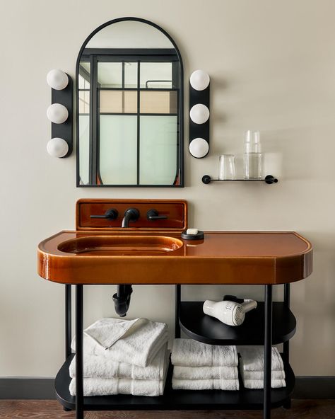 Hotel Lobby Bathroom, Bathroom Light Fixtures Modern, Hotel Vanity, Bathroom Light Fittings, Farmhouse Bathroom Lighting, Bathroom Lights Over Mirror, Bronze Tiles, Modern Bathroom Light Fixtures, East Side New York