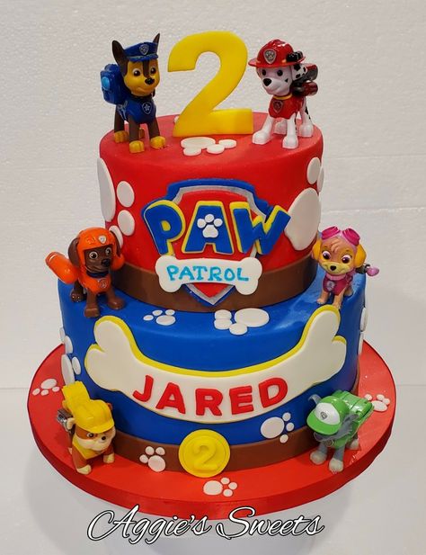 Paw Patrol Birthday Cake #aggiesSweets Two Tier Paw Patrol Birthday Cake, Paw Patrol Cake 2nd Birthday, Paw Patrol First Birthday Cake, Paw Patrol Birthday Decorations Boy, Paw Patrol Birthday Cake Ideas, Paw Patrol Cakes For Boys, Paw Patrol Cake Ideas Boys, Paw Patrol 4th Birthday Cake, Paw Patrol Cake Boy