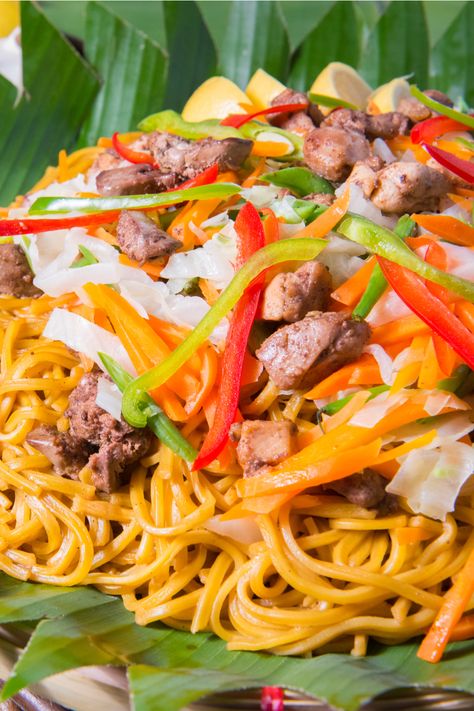 When you're in the tropical country of the Philippines, there's more to Filipino food beyond the famous adobo, sinigang, or sisig that are always at the top of lists on what to eat  – and that includes pancit. Pancit Guisado, Bihon Guisado, Bihon Recipe, Pancit Noodles, Guisado Recipe, Rice Sticks, Filipino Pancit, Pancit Bihon, Pancit Canton