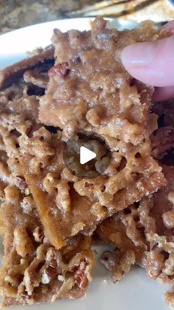 Amy Ammann Pawelek on Instagram: "Old school favorite!!! Easy Praline Toffee  using Graham crackers!!! Be warned it is addictive!!! Screen shot recipe at the end of the reel and tag me if you try it!!! Enjoy!!!

#companycoming #pralinetoffee #grahamcrackers #easyrecipes #sweet #delicious #yummy #foryou #sweetrecipes #food #partyideas #partyfood #pecans #holidayideas" Graham Cracker Toffee, Sugared Pecans, Shot Recipes, Pecans, Graham Crackers, Toffee, Screen Shot, Try It, Party Food