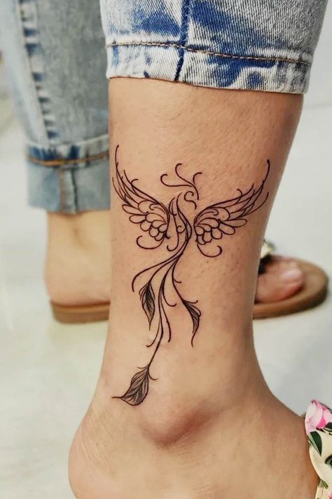 Amazing Phoenix Tattoo Ideas With Greater Meaning ★ Simple Leg Phoenix Tattoo Leg Phoenix Tattoo, Phoenix Tattoo Ideas, Tato Phoenix, Phoenix Tattoo Feminine, Small Phoenix Tattoos, Tato Tradisional, Phoenix Tattoos, Remembrance Tattoos, Phoenix Tattoo Design