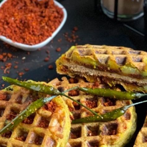 Ritu Khemka on Instagram: "Healthy Ulta Vada Pav Waffles 🤤😅😍 New Recipe Alert 🔔 Monsoon special 🌧️+ 🧇+ ☕️= ❤️ This tasty ulta vada pav waffles are truly hard to put down and I bet you’re never going back to the fried version after trying this recipe 😍😎 They are super soft, spicy, delicious and tastes exact same as street style ones yet healthy ☺️❤️ So do try this recipe soon, thank me later and don’t forget to tag me 😀 📌 Save & Share the recipe! Follow @thehealthyrasoi for more Ingredi Waffle Maker Indian Recipes, Pakora Waffles, Vada Pav Snapchat, Mini Vada Pav Bites, Mumbai Vada Pav Photography, Gujarati Recipes, Indian Snacks, Party Food, New Recipes