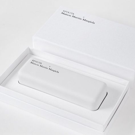 So simple and perfect! Hand-made in Berlin! Find our Mykita + Maison Martin Margiela eyewear collection in store and online at… Eyewear Packaging, Sunglasses Packaging, Graphic Design Packaging, Creative Packaging, Martin Margiela, Packaging Design Inspiration, Print Packaging, Packaging Labels, Brand Packaging