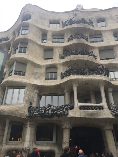 Gaudi's La Pedrera on Passieg de Gracia is another great example of a Modernisme building reflecting nature. It's unique facade is intended to imitate the moving sea. Even more so, the iron railings, a new material of the Modernisme era, depict seaweed motifs. Casa Mila, Gaudi Architecture, La Pedrera, Permanent Vacation, Iron Railing, Best Vacations, Source Of Inspiration, Leaning Tower Of Pisa, Barcelona