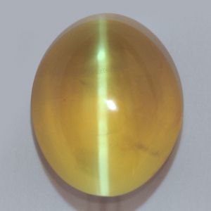 Cats Eye Gem, Yellow Gems, Gemstone Art, Cats Eye Stone, Cool Rocks, Vedic Astrology, Star Sapphire, Cats Eye, Cat Eyes