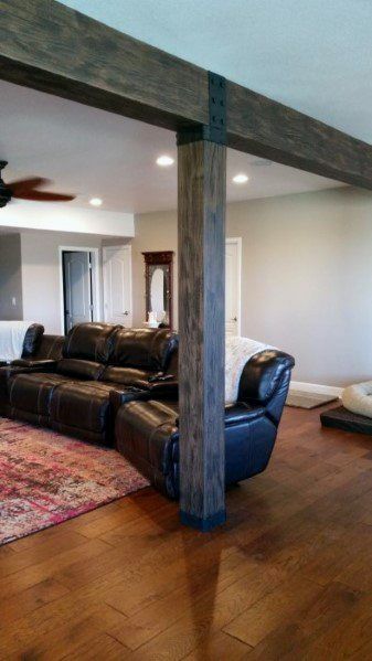 Discover how to hide unsightly support beams and steel posts with the top 50 best basement pole ideas. Explore unique downstair column cover designs. Basement Poles, Support Beams, Diy Basement, Faux Beams, Waterproofing Basement, Small Basements, Basement Makeover, Basement Ceiling, Basement Walls