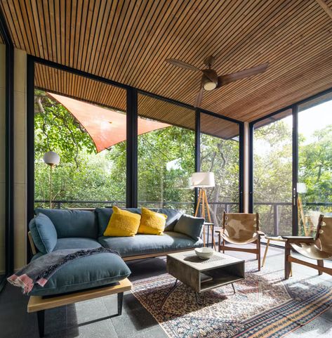 An Off-Grid Cabin Wrapped in Glass Hunkers in a Hawaiian Forest - Dwell Modern Screen Porch, Kitchen Lounge Ideas, Modern Sunroom, Cabin Rooms, Screen Porch Ideas, Shell Knob, Slate Floor, Four Seasons Room, Glass Cabin