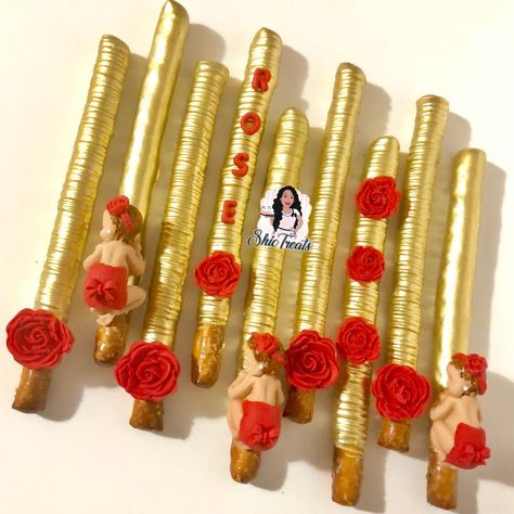 Golden Chocolate Pretzel Rods Red And Gold Chocolate Covered Pretzels, Football Pretzel Rods, Pretzels Sticks, Pretzel Ideas, Valentine's Goodies, Chocolate Covered Pretzel Sticks, Chocolate Pretzel Rods, Chocolate Dipped Pretzel Rods, Golden Chocolate