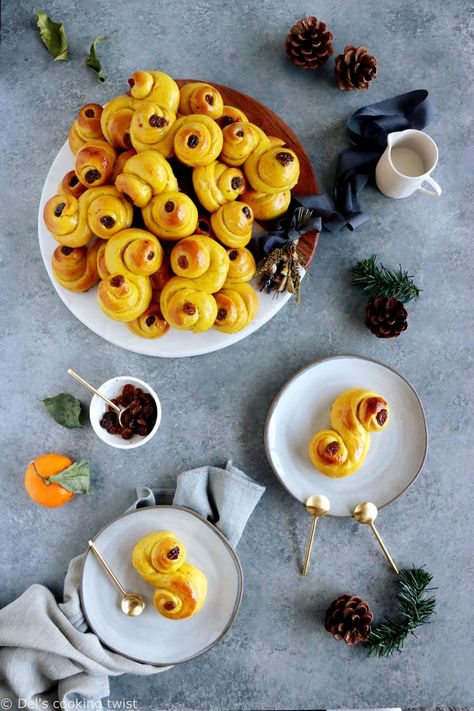 Swedish Saffron Buns “Lussekatter” (or St Lucia Buns) are an S-shape sweet bun flavored with saffron. They are traditionally eaten around Christmas in Sweden, and especially on Saint Lucy’s Day, together with some mulled wine “glögg”. #christmasrecipes #swedishchristmas #christmasaroundtheworld #fika #saffronbuns St Lucia Buns, Christmas In Sweden, Saffron Buns, Saint Lucy, Comfort Desserts, Holiday Dinner Party, Sweet Buns, Swedish Christmas, Swedish Recipes