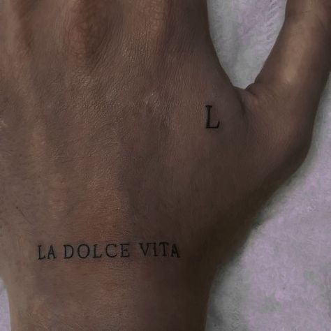 la dolce vita hand tattoo dark aesthetic inspo La Luna Tattoo, Luna Tattoo, Tattoo Dark, La Tattoo, Funky Tattoos, Hand Tattoos For Girls, Sick Tattoo, Spine Tattoo, Subtle Tattoos