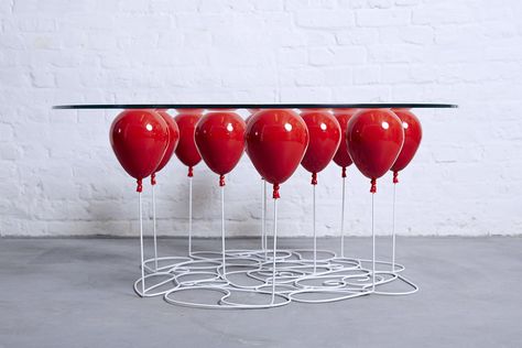 The whimsical Balloon Table by Duffy London Floating Balloons, Unique Desks, Silver Balloon, Up Balloons, Alexander Calder, Red Balloon, Glass Top Table, Helium Balloons, Art Table