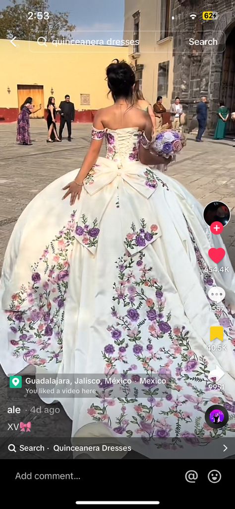 White Quince Dress With Flowers, Mexican Theme Quinceanera Dresses, White Quince Dress, Mariachi Quinceanera Dress, Quinceanera Songs, Purple Quince Dress, Enchanted Forest Quinceanera Theme, White Quince Dresses, Vestido Charro