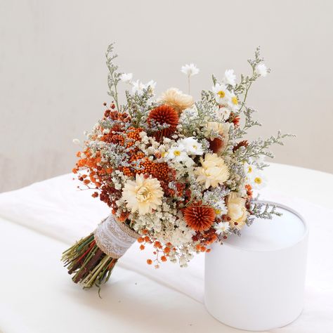 Globe Thistle+Daisy Dried Flower Bridal Bouquet,Wild Flower Bride Bouquet,Boho Wedding Theme Dried Flowers,Dried Flowers Bouquet For Wedding  S Size: 11-12" height, 4-5" overall width M size: 11-12" height, 6" overall width L Size: 12-13" height, 7-8" overall width XL Size: 13-14" height, 9-10" overall width Boutonniere 4-5" height Note: The picture only shows the bride bouquet ， Please carefully check the drop-down menu to select the item you need Provide customized bridesmaids, corsages,and ar Orange Rose Bridal Bouquet, Flower Bride Bouquet, Dried Flower Bridal Bouquet, Orange Wedding Bouquet, Flower Bride, Boho Wedding Theme, Orange Bouquets, Orange Wedding Flowers, Burnt Orange Weddings