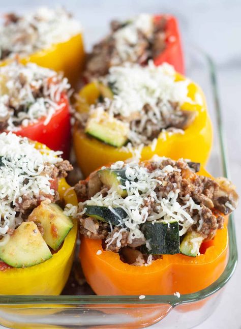 These Low-Carb Stuffed Peppers combine ground beef, veggies, and marinara sauce for an easy and healthy allergy-friendly dinner any night of the week. Plus, they are paleo, gluten-free, and whole30-compliant! #keto #ketostuffedpeppers #whole30 #whole30stuffedpeppers #paleo #paleostuffedpeppers #glutenfree #glutenfreestuffedpepper #stuffedbellpeppers #dairyfree #dairyfreestuffedpeppers Stuffed Bell Peppers With Zucchini, Stuffed Bell Peppers With Mushrooms, Whole 30 Stuffed Peppers, Stuffed Bell Peppers Turkey, Paleo Stuffed Peppers, Mushroom Dishes, Zucchini Mushrooms, Ground Turkey Stuffed Peppers, Low Carb Stuffed Peppers