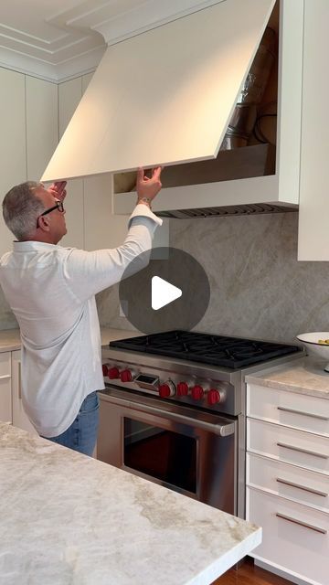 Newton Kitchens & Design on Instagram: "A unique solution to easily access your range hood! We’ve designed so many beautiful custom hoods over the years but accessing the mechanics for maintenance has always been a challenge. Do you think you would have noticed this hidden lift?⁣
⁣
#hiddenstorage #hiddenspaces #interiordesign #craftsmanship #customcabinets #cabinetry #kitchencabinets #kitchendesign #kitcheninspo #kitchenhack #rangehood" Hoods Over Stoves, Forrest Frank, Kitchen Hood Ideas, Ceiling Hood, Connor Price, Hood Ideas, Custom Range Hood, Hidden Spaces, Hidden Kitchen