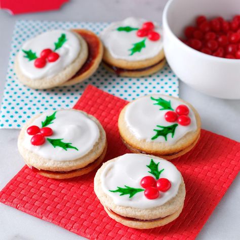 Holly Berry Cookies Recipe -What would Christmas be without overflowing tins of cookies? These festive filled cookies are the all time favorites of my family. Back when our children were small, we began baking them the day after Halloween and put them away in the freezer. —Audrey Thibodeau, Gilbert, Arizona Christmas Cutout Cookies, Berry Cookies, Best Christmas Cookie Recipe, Best Cookies Ever, Christmas Cutouts, Christmas Cookie Recipes, Cinnamon Cookies, Filled Cookies, Best Christmas Cookies