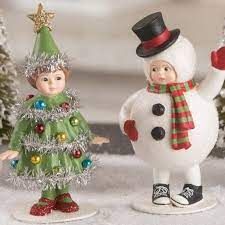 Bethany Lowe Seasonal Figurines and Collectibles | Cuddle Decor Folk Art Decor, Bethany Lowe Designs, Snowman Figurine, Silver Tinsel, Bethany Lowe, The Snowman, Christmas Figurines, Christmas Love, Holiday Design