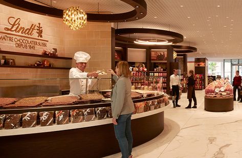 A real Lindt Master Chocolatier inspects a freshly made chocolate bar Chocolate Lindt, Fresh Food Market, Swiss Chocolate, Supermarket Design, Lindt Chocolate, Sweet Gift Ideas, Chocolate Shop, Food Market, Chocolate Bar