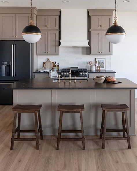 Kitchens of Instagram | Taupe cabinets and these stunning black countertops are a match made in Heaven 😇 ⁠ ⁠ @hellomillerdesign @rhseriesbycaliber @caliberhomes... | Instagram Taupe Cabinets, Taupe Kitchen Cabinets, Monochromatic Kitchen, Black Soapstone, Taupe Kitchen, Kitchen And Pantry, Transitional Interior Design, Black Countertops, Concept Kitchen