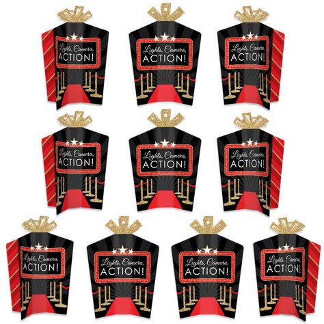 PRICES MAY VARY. Red Carpet Hollywood Fold and Flare Centerpieces INCLUDE: 10 heavy-duty paper centerpieces in our Red Carpet Hollywood theme. Each centerpiece has art on all four sides and starburst top for an impressive display. Some simple folding assembly required. EASY TABLE DECOR: Each Red Carpet Hollywood centerpiece SIZE 5 inches wide (front/back) x 3 inches wide (sides) x 10.5 inches tall. This 10 count table decorations set requires easy folding to flare out each centerpiece at your de Hollywood Decor, Paper Centerpieces, Red Carpet Party, Table Centerpiece Decorations, Hollywood Theme, Movie Night Party, Hollywood Party, Black Hollywood, 10 Count