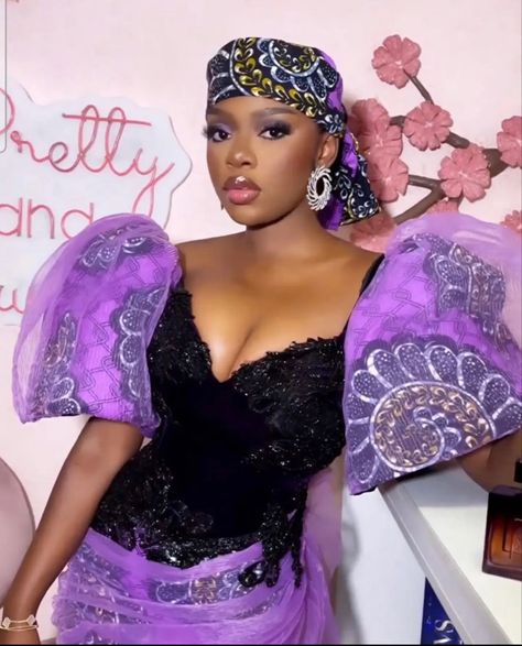 #nigerianwedding #asoebi #africanprintdresses #aesthetic #africanfashion #ankarastyles #africanprint #classystyles #puffshoulder #puffyshoulder #netankara #celebritydress #ankara #melaninpopping #corsetankara #corset #corsetstyles Purple Ankara, Modele Wax, Ankara Dress Designs, Dinner Gown, African Traditional Wedding Dress, French Embroidery, Birthday Outfit For Women, Ankara Dress Styles, African Traditional Wedding