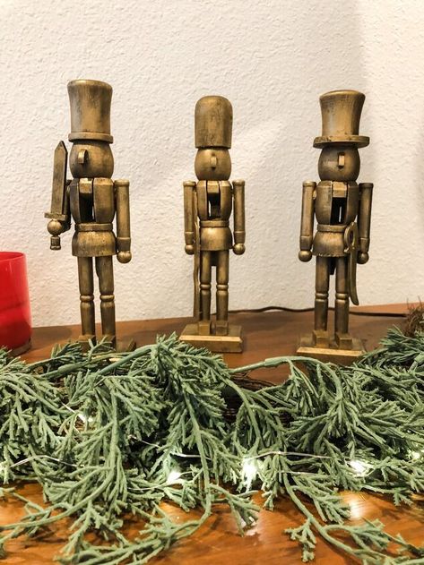 Nutcracker Christmas Tree Diy, Wooden Nutcrackers Diy, Wood Nutcracker Diy, Diy Small Nutcracker, Rustic Nutcracker Decor, Dollar Tree Nutcracker Diy, Dollar Tree Nutcracker, Spray Painted Nutcracker Diy, Dollar Tree Diy Christmas Decor