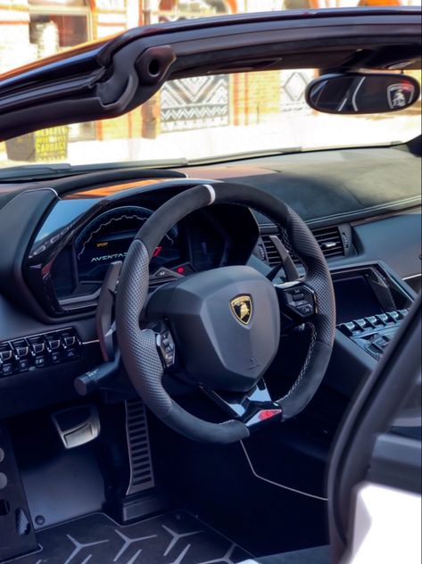 A supercar near the shopping mall. The photo showed the interior of the Lamborghini SVJ. The configuration includes a white paint colour with black elements and carbon. The roof of the vehicle has been removed. Lamborghini Svj Black, Lamborghini Svj, Lamborghini Interior, White Details, Stunning Interiors, Lamborghini Aventador, Dream Car, White Interior, Supercars