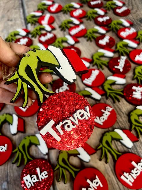 Personalized Grinch Ornaments, Grinch Hand, Christmas Place Settings, Grinch Christmas Party, Grinch Hands, Monogram Stockings, Stocking Tags, Grinch Ornaments, Christmas Place