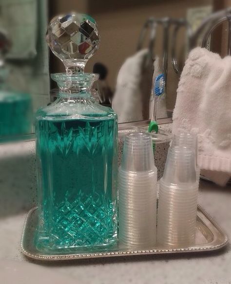 No more boring mouthwash bottles!! Glass Brandy decanter will class it up. Add a small silver plate and one use mini cups and you have a sofisticated dental hygiene station. Bathroom Renovation Diy, Small Bathroom Diy, Small Bathroom Organization, Diy Bathroom Remodel, Diy Remodel, Small Bathroom Decor, Mouthwash, Cool Stuff, Diy Bathroom