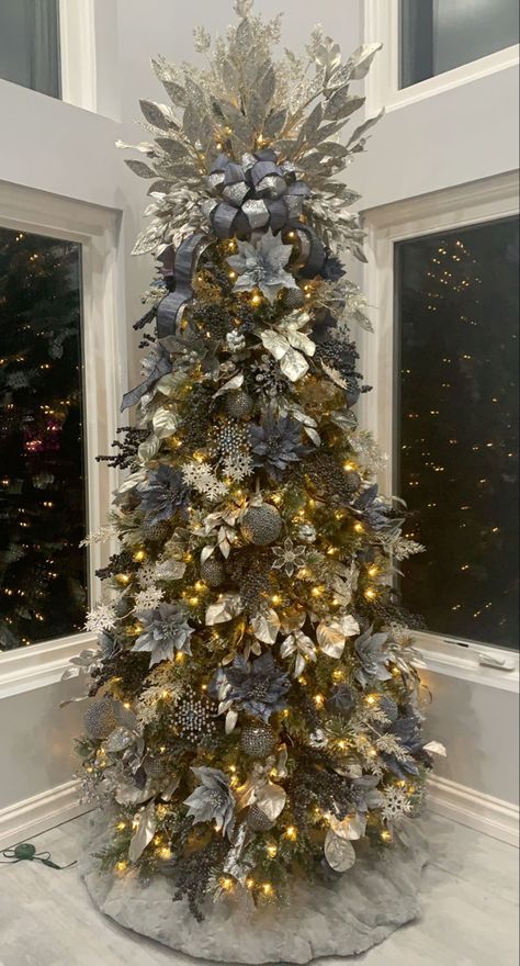 Silver And Navy Christmas Tree, French Country Christmas Tree Ideas, Gray Christmas Tree Decor, Christmas Tree Ideas Blue And Gold, Blue Flocked Christmas Tree, Blue And Silver Christmas Decorations, Grey Christmas Tree, Blue Christmas Tree Decorations, Glam Christmas Tree