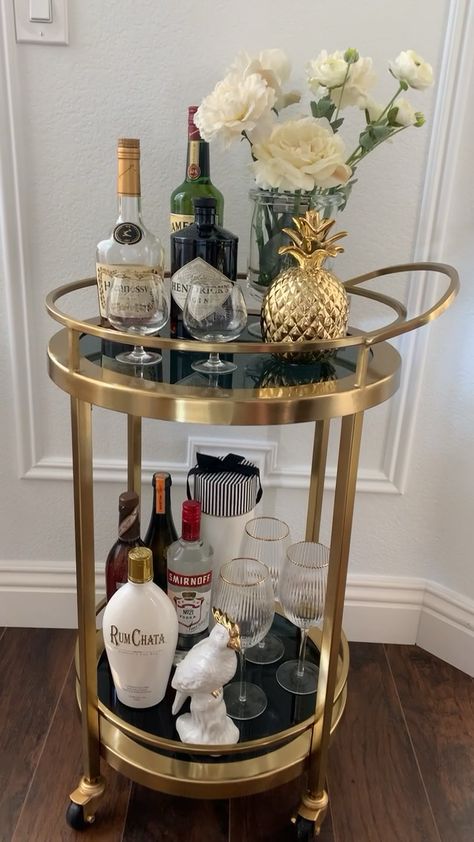 Bar Table Home, Round Drinks Trolley Styling, Round Bar Cart Decor, Gold Drinks Trolley, Alcohol Trolley Bar Ideas, Round Bar Cart Styling Ideas, Black And Gold Dining Room Decor, Gold Bars Aesthetic, Round Bar Cart Styling