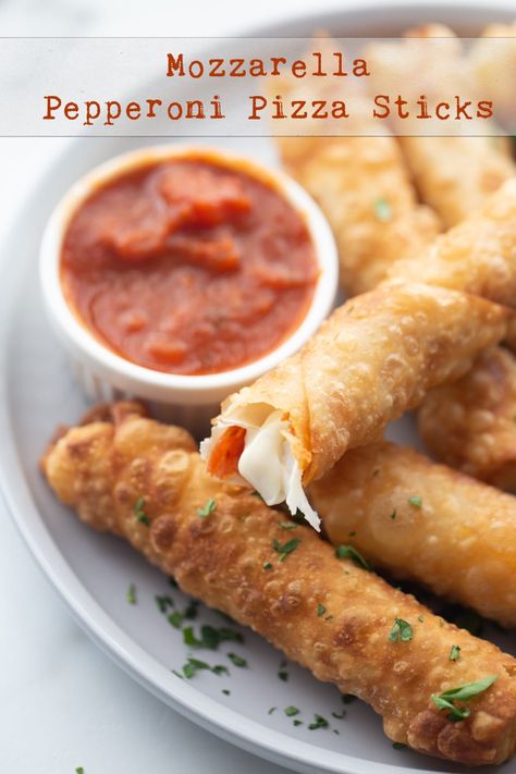 Mozzarella Pepperoni Pizza Sticks made with egg roll wrappers are crunchy on the outside with gooey cheese and pepperoni on the inside. These are a fun appetizer for any party. via @cmpollak1 Pepperoni Pizza Sticks, Pepperoni Sticks, Pizza Sticks, Restaurant Appetizers, Mozzarella Recipes, Hot Appetizers, Egg Roll Wrappers, Mozzarella Sticks, Superbowl Party Food