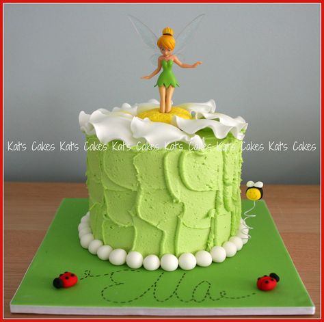 Tinkerbell cake for Ella's 7th Birthday.   Cake: Top Deck mud  Filling: Chocolate ganache  Finish: Vanilla buttercream  Decorations: Hand made from fondant except Tinkerbell (she is a toy) Tinkerbell Birthday Cakes, Fairy Birthday Cake, Tinkerbell Birthday, Tinkerbell Cake, Peter Pan Party, Tinkerbell Party, Fairy Cakes, Fairy Birthday Party, Fairy Party