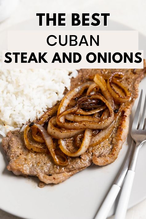 A white plate with bistec de palomilla with white rice and a fork and the words "the best cuban steak and onions" in the foreground Bistec De Palomilla Recipe, Cuban Steak Marinade, Cuban Palomilla Steak Recipe, Cuban Steak And Onions, Steak And Onions Puerto Rican, Dominican Steak And Onions, Thinly Sliced Top Sirloin Steak, Palomilla Steak Recipe, Spanish Steak And Onions