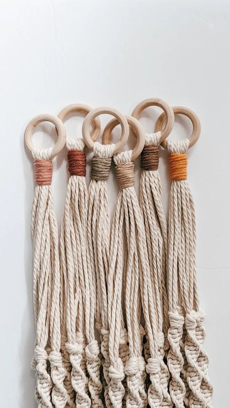 This macrame plant hanger is a bestseller, with spiral style and a boho fringe. Just a touch of color keeps this plant hanger neutral, but definitely not boring! These hangers look nice with vine plants (like ivy or philodendron) or a bright succulent. The hanger can hold a 4” (small) - 8” (large) pot or basket. Suitable for all ages, children or adults! Finishes product total length is 36”, pot hangs at approximately 24”. *Colors are listed from left to right: Blush is far left, marigold Macrame Diy Plant Hanger, Colorful Macrame, Vine Plants, Macrame Hammock, Macrame Wall Hangings, Macrame Mandala, Macrame Planter, Macrame Supplies, Small Macrame