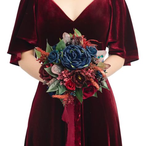 PRICES MAY VARY. Package: A bridesmaid bouquet with dark red and navy blue ribbons. Size: The bouquet is approx. 7" W x 13" H. Material: Made of high-quality silk/foam flowers and silk greenery. Silk flowers include navy blue austin rose, burgundy and dark red Escimo rose, burgundy peony Foam flowers include navy blue high-centered rose, burgundy rose, navy blue rose, navy blue petite rose. Other accessories include turmeric dog's tail grass, holly fruits, ficus leaves, laurel leaves, eucalyptus Navy Bridesmaid Bouquet, Tossing Bouquet, Bouquets For Bridesmaids, Jewel Tone Wedding Flowers, Navy Blue Bouquet, Artificial Flower Wedding Bouquets, Navy And Burgundy Wedding, Winter Bridal Bouquets, Navy Blue Bridesmaids