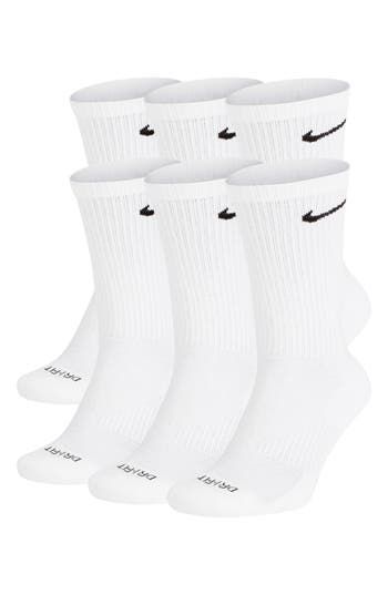 Sweat-wicking Dri-FIT knit with breathable mesh at the top of the foot and a fit-enhancing arch band ensure cool comfort in these cushioned crew socks. Pack of six pairs Cotton/polyester/spandex/nylon Machine wash/tumble dry Imported White Nike Dri Fit Socks, White Nike Crew Socks, Long White Nike Socks, Nike Socks Dri Fit, White Nike Socks Aesthetic, High Nike Socks, Long Nike Socks, Volleyball Wishlist, Birthday Gift Wishlist